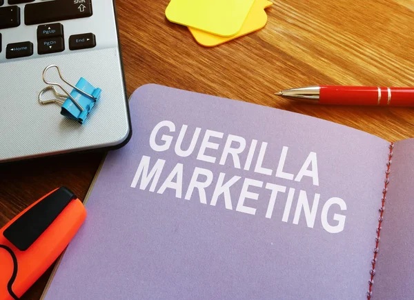 Buku catatan bertuliskan guerilla marketing