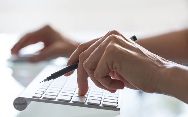 https://depositphotos.com/photo/close-up-of-woman-hands-on-computer-keyboard-21951973.html